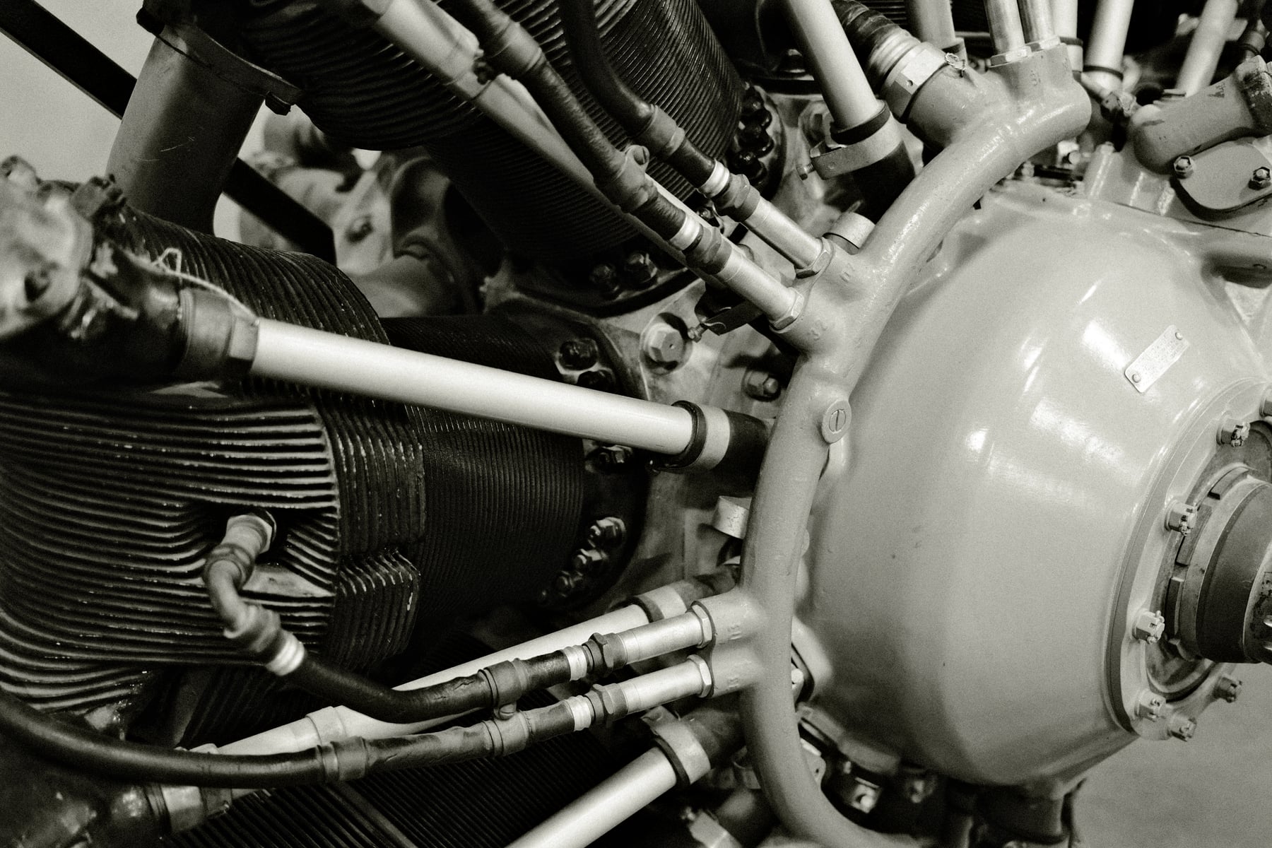 Radial aircraft engine in black and white, concentric cylinders radiating from center